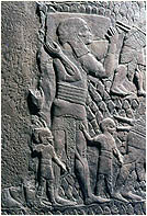 Fig. 33. The relief: A Judean family leaving the destroyed city